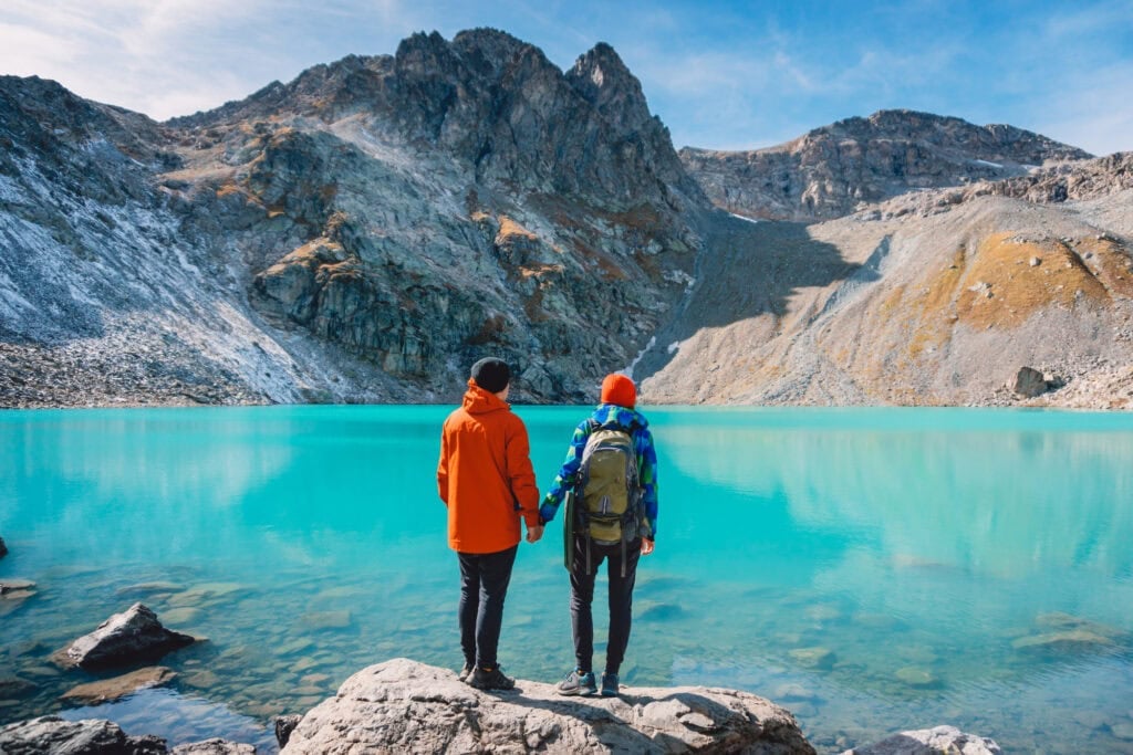 couple on a mountain hike for the article 22 Real Online Businesses You Can Start From Anywhere